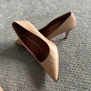 Coach heels- dinged in the heels. Shoe cobbler can fix that right up!